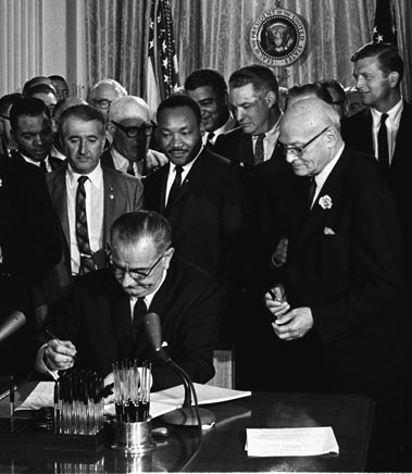 Lyndon B. Johnson, who had earlier brushed aside Dr. King’s request for a voting rights act, sent a draft of such a bill to Congress just two weeks after Bloody Sunday, and signed it into law four months later. It was the culminating point of victory for the black insurgency (LBJ Library)