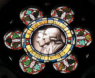 The stained-glass roundel at the front of the Wesley Memorial Church includes the image of the Wesley brothers from their memorial in Westminster Abbey.  