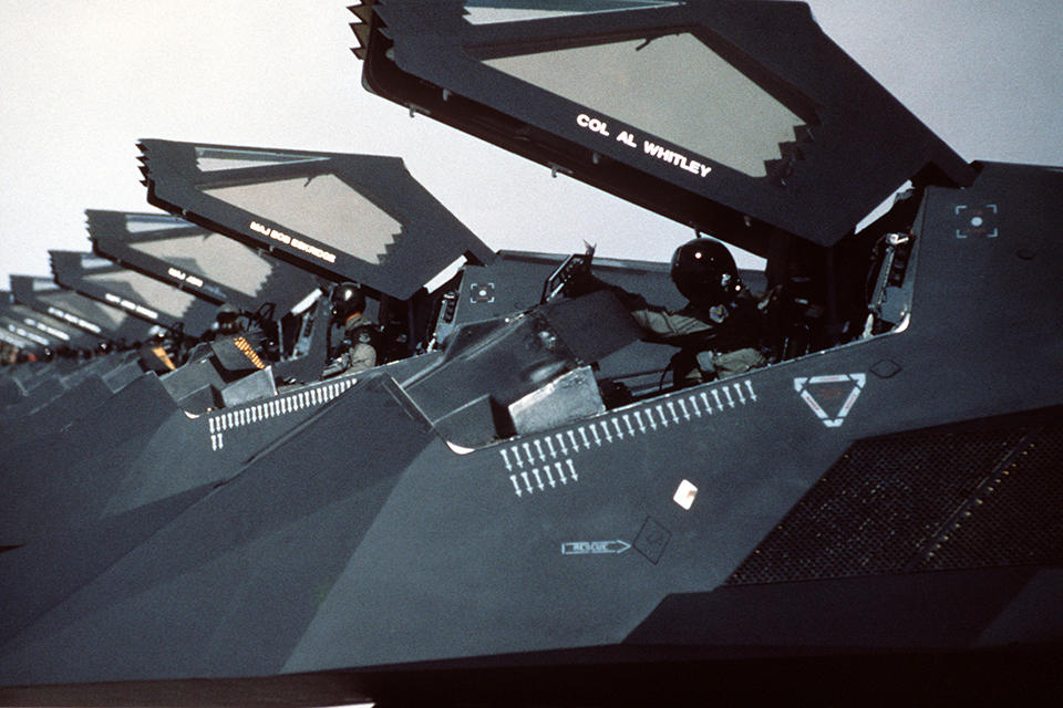 F-117 stealth fighters from the 37th Tactical Fighter Wing stand on the flight line with canopies raised following their return from Saudi Arabia and Operation Desert Storm. (USAF photo)