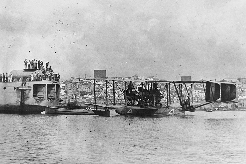 The only one of the Nancies to reach Lisbon—ironically, “Lame Duck” NC-4, commanded by Lt. Cmdr. Albert C. Read—was photographed in Lisbon Harbor alongside the seatender Shawmut. (Naval History and Heritage Command)
