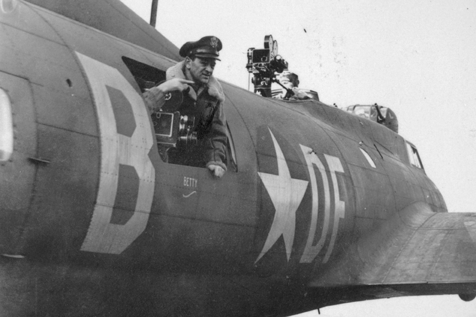 Movie director William Wyler used one of the squadron’s B-17s, “The Bad Penny,” as a camera ship for his award-winning documentary about “Memphis Belle.” He placed cameras at a number of gun stations on the bomber and flew five missions in order to get his footage. (National Archives)