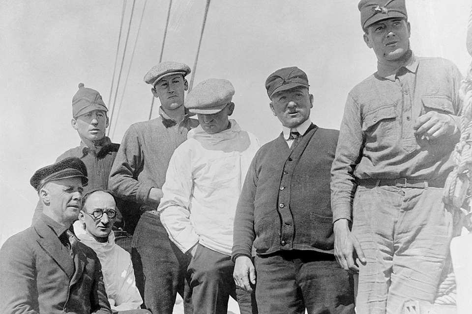 The polar expedition returns to Wiscasset, Maine, in the fall of 1925. Shown here, seated from left, are MacMillan and engineer John Jayne; standing from left are John McCue, Donald Mix, Eugene Livingston, William Lewis and Richard Goddard. (Corbis Images)