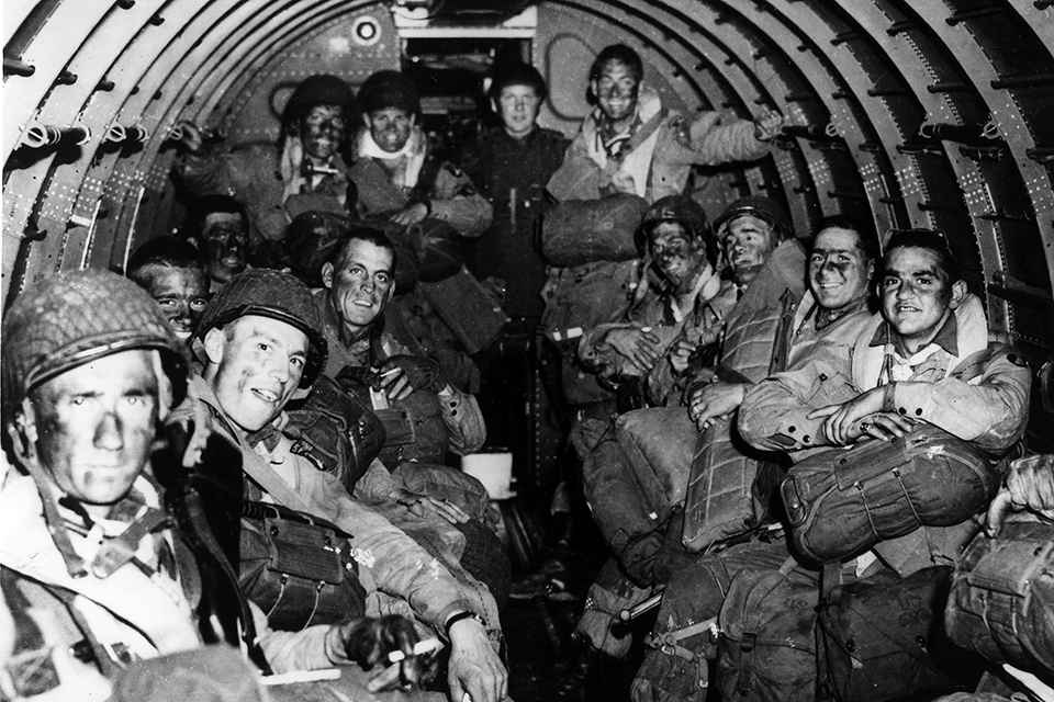 Paratroopers and their equipment cram the interior of a C-47 shortly before takeoff to their drop zones in Normandy. (National Archives)