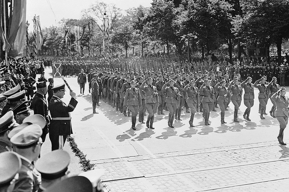 Mission accomplished: Generalfeldmarschall Hermann Göring, at left with Generalmajor Wolfram Freiherr von Richthofen to his left, reviews Condor Legion personnel returning to Germany on June 9, 1939. (Bettmann/Corbis)