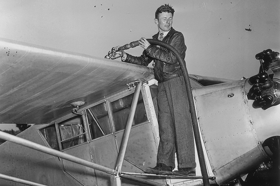 Corrigan fuels his plane with 320 ­gallons of gasoline before taking off from Floyd Bennett Field, N.Y.—ostensibly for California—on July 17. The next day he landed at Baldonnel Airport, near Dublin. (AP Wide World)