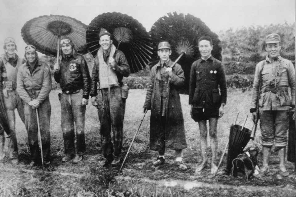The crew of the number 13 airplane, (left to right) Lt. Clayton J. Campbell, Sgt. Adam R. Williams, Lt. Edgar E. McElroy and Sgt. Robert C. Bourgeois were found by Chinese soldiers and civillians. (National Archives)