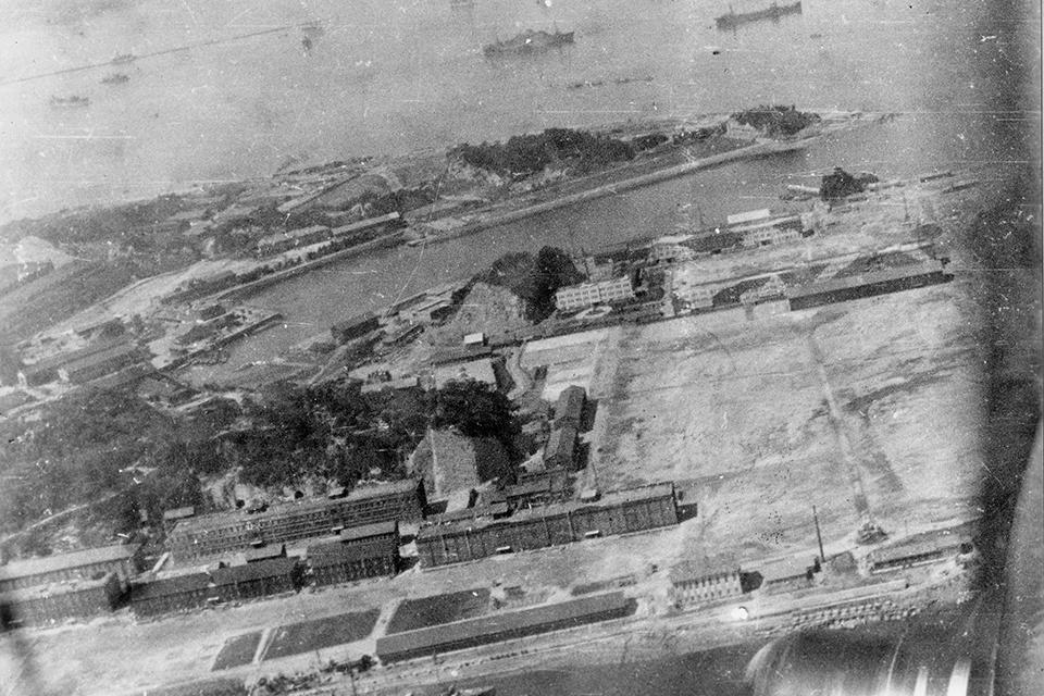 Although most crew members had cameras with them only one returned with photographs taken in the air over Japan. This is the Yokosuka Naval Base taken by No.13's Navigator, Lt. Clayton J. Campbell. The camera belonged to Lt. Knobloch.