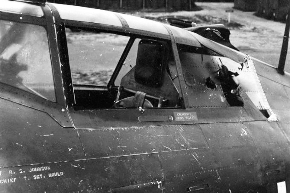 Some of the damage Johnson’s P-47 absorbed during combat on June 26, 1943. (National Archives)