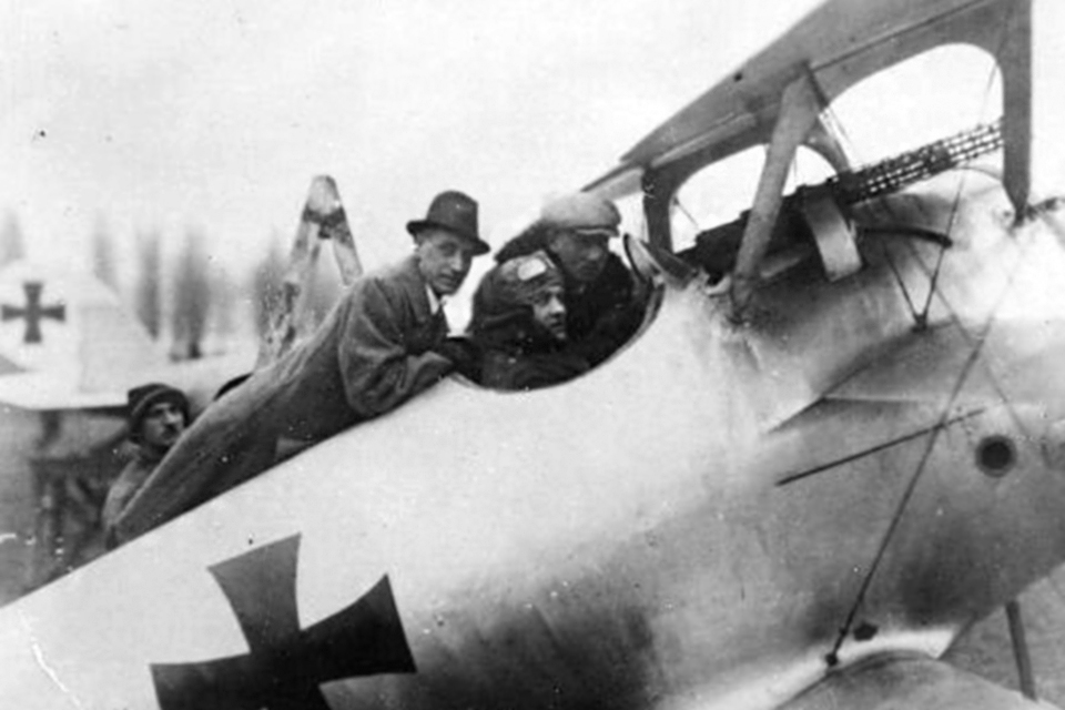 Seeking a replacement for the Albatros D.V, Richthofen prepares to test fly a Pflaz Dr.1 triplane. Behind him is Pfalz construction chief and co-owner Ernst Everbusch. (Greg van Wyngarden Collection)