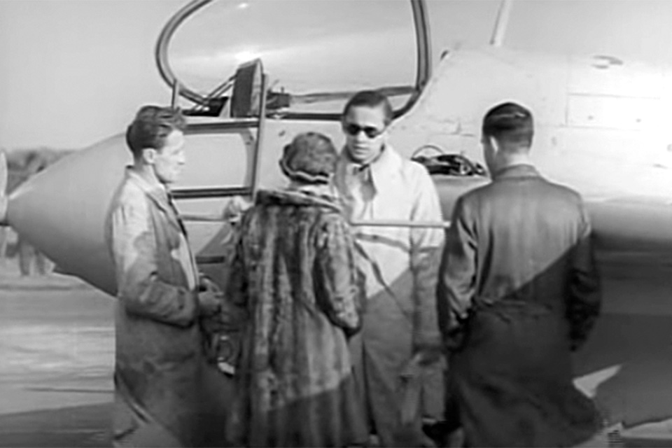 In an image taken from newsreel footage, test pilot Heini Dittmar chats with Reitsch (in fur coat). Her tests of the rocket-powered Me-163 “Komet” ended when she crashed while attempting to land the plane with the dolly undercarriage—which was meant to fall away on takeoff but had hung up—still attached.