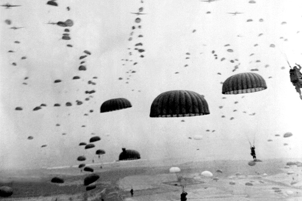 Paratroopers and their equipment cram the interior of a C-47 shortly before takeoff to their drop zones in Normandy. (National Archives)