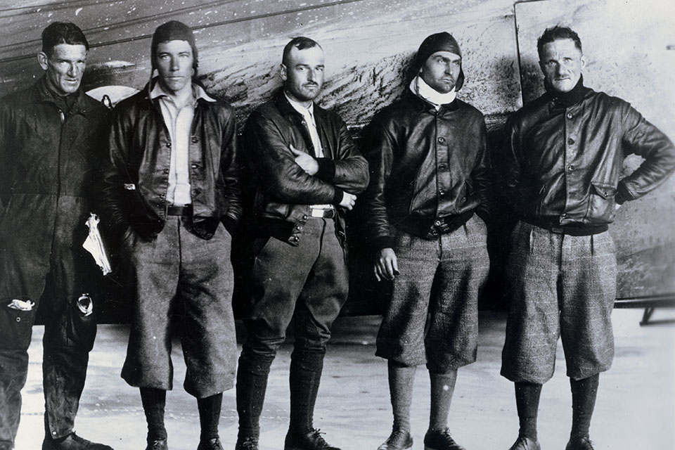 The crew of the Fokker C-2 'Question Mark’ poses for a photo after a grueling seven days in the air: (from left) Sergeant Roy Hooe, Lieutenant Elwood 'Pete' Quesada, Lieutenant Harry Halverson, Captain Ira C. Eaker and Major Spaatz. (U.S. Air Force)