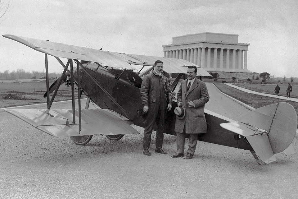 After another high-profile touchdown, Lawrence (left) poses with his Sperry Messenger near the Lincoln Memorial in Washington, D.C., in March 1922. A year and a half later he went down in the English Channel in that same aircraft. (Jesse Davidson Aviation Archives)