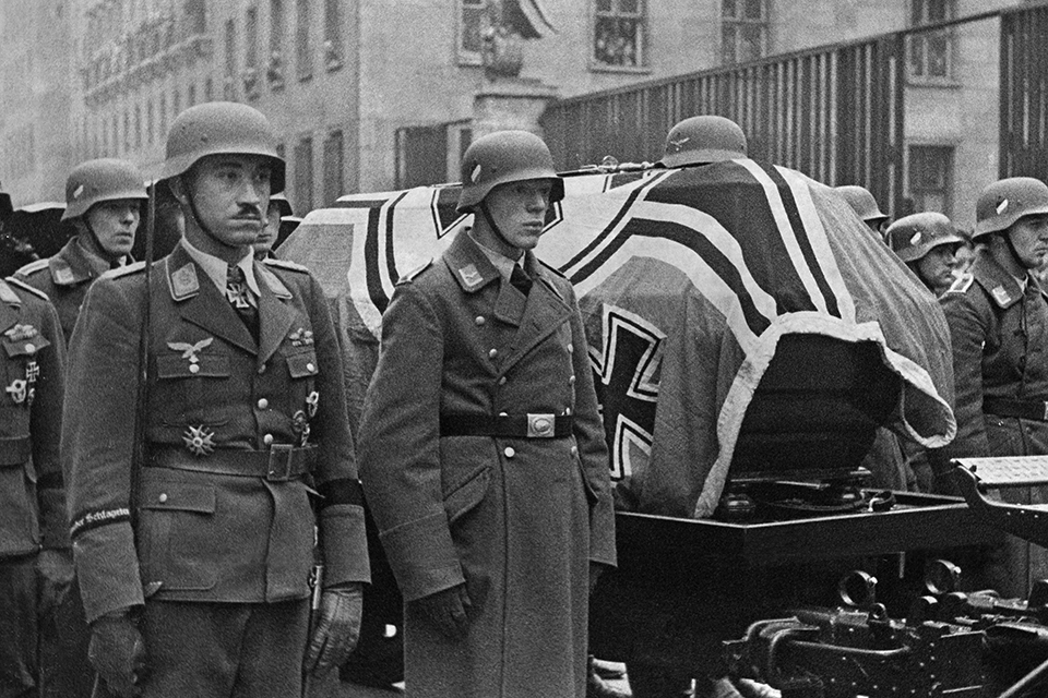 Following Udet’s suicide on November 17, 1941, A Luftwaffe honor guard—including ace Major Adolf Galland at left—escorted his remains to their final resting place. (Ullstein Bild via Getty Images)