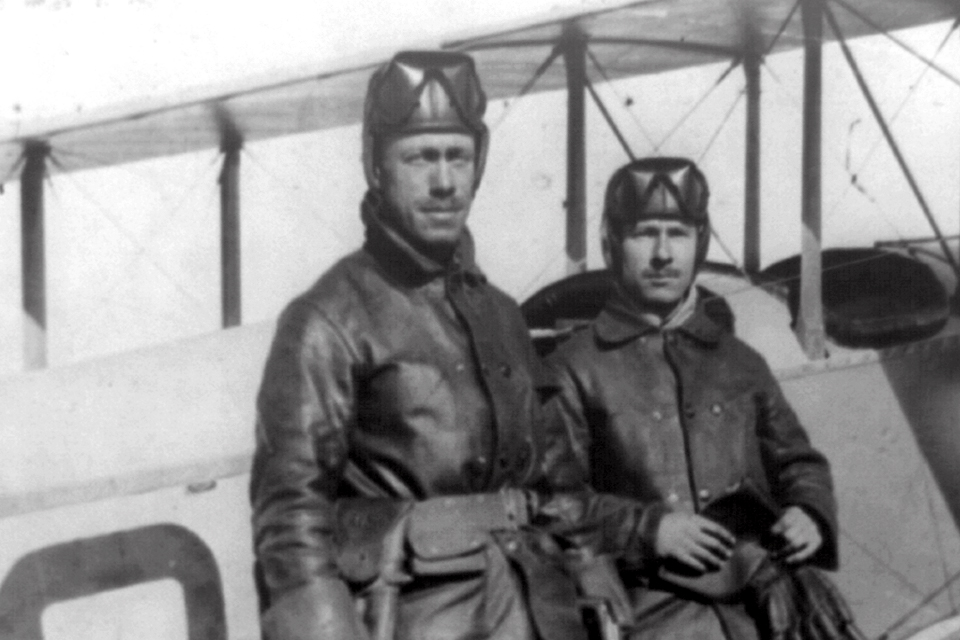 Lieutenants Herbert A. Dargue (left) Edgar S. Gorrell stand alongside an airplane at the Mexican front during the expedition into Mexico. (Library of Congress)