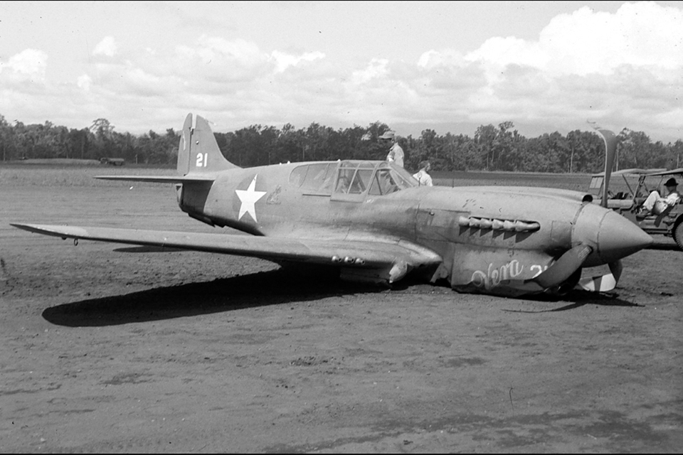 7th Fighter Squadron pilot 1st Lt. John Griffith barely made it out of the May 14, 1943, melee with Nishizawa's Zeros, crash-landing his Curtiss P-40 at the air base on Dobodra. (National Archives)
