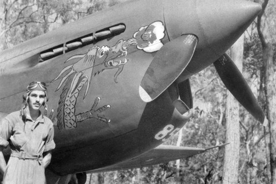 George Preddy stands with his Curtiss P-40 Warhawk "Tarheel." Preddy flew the rugged fighter in the Southwest Pacific with the 49th Fighter Group until October 1942. (National Archives)