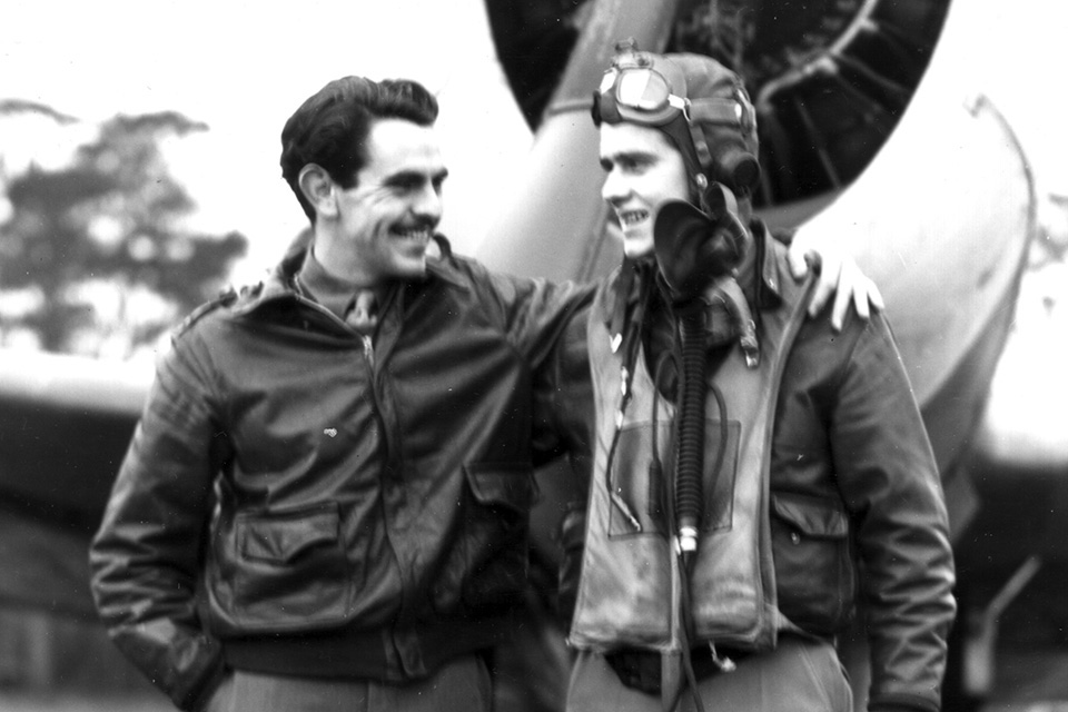 Preddy (left) reunites with his wingman, 1st Lt. William Whisner, shortly after having to bail out of his flak-stricken Republic P-47D Thunderbolt over the English Channel on January 29, 1944. (National Archives)