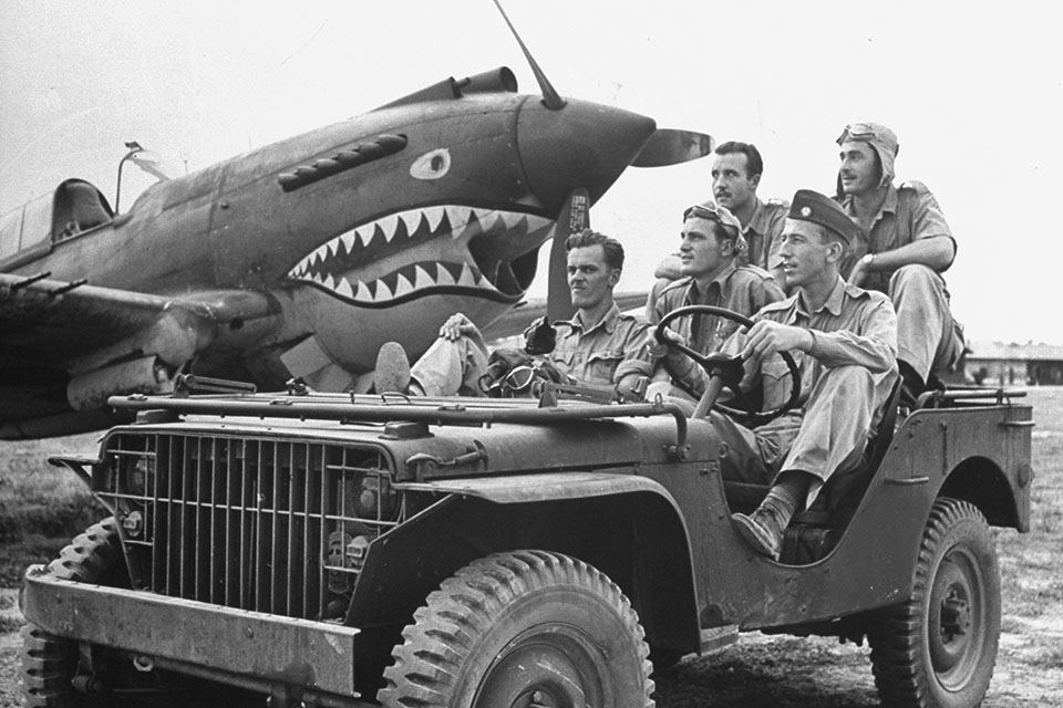 Posing for the cameras of Life Magazine at Mingladon Air field, near Rangoon are Flying Tigers, Jack Newkirk, Henry Gesselbracht, Jim Howard (front seat), Bill Bartling and Robert Layher (back seat). (George Rodger/Time Life Pictures/Getty Images)