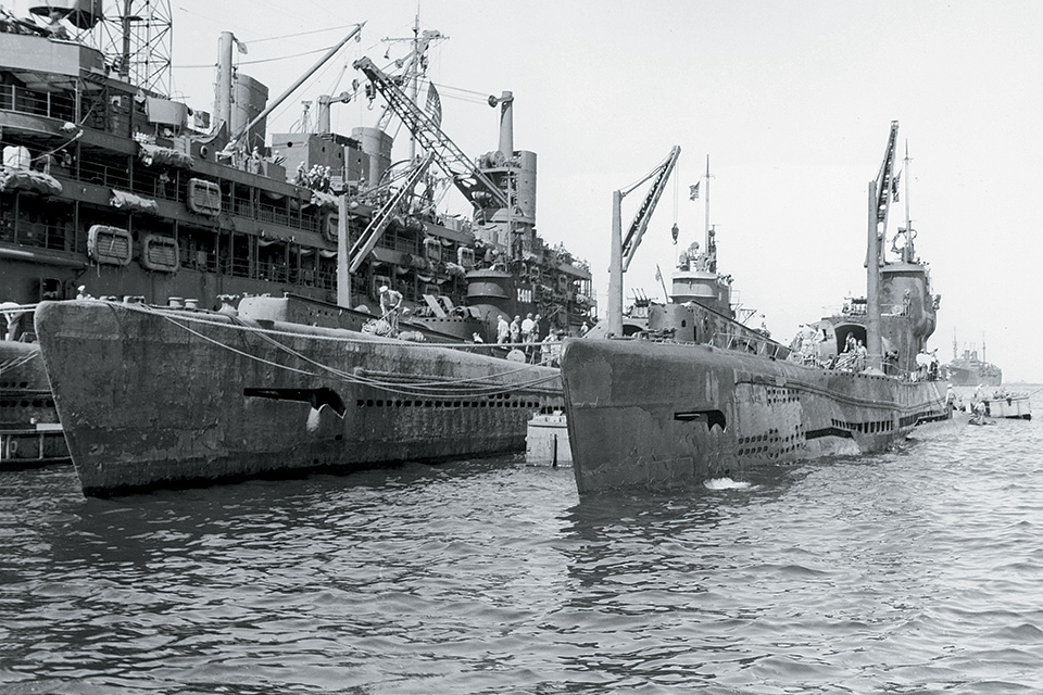 From left, Japanese aircraft-carrying submarines I-400, I-401 and I-14 are moored next to the USS Proteus at Yokosuka in Tokyo Bay on September 7, 1945. Each of the I-400s could carry three Seiran bombers. (National Archives)