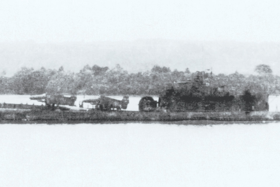 A rare photo shows I-400 with two Seirans on its deck during training in Japanese waters. (Courtesy Crecy Publications)