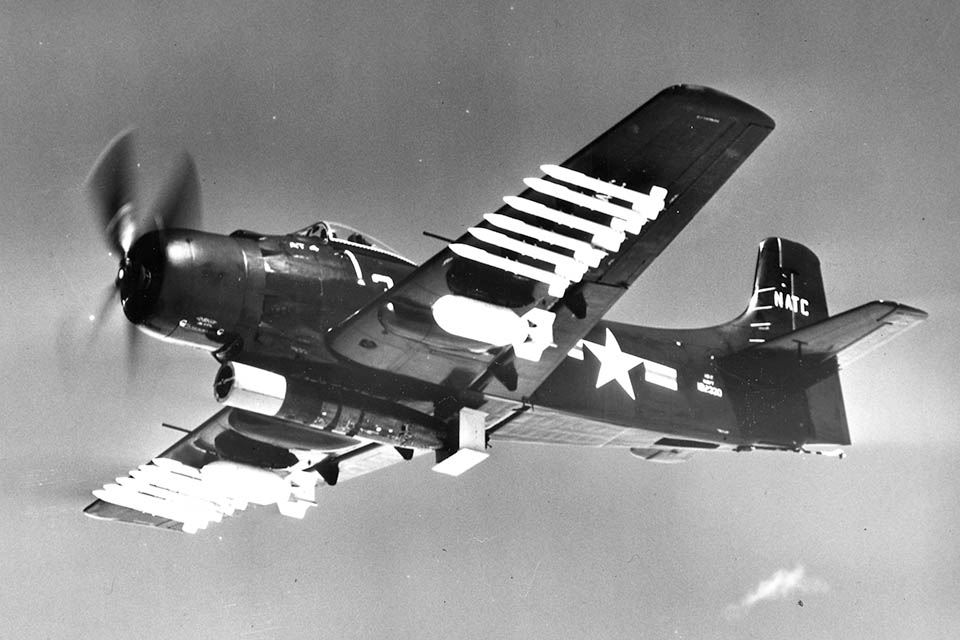 An AD-2 carries 5-inch rockets, two 1,000-pound bombs and a Mk. 13 aerial torpedo during weapons trials, probably in 1948. (Courtesy of David W. Ostrowski)
