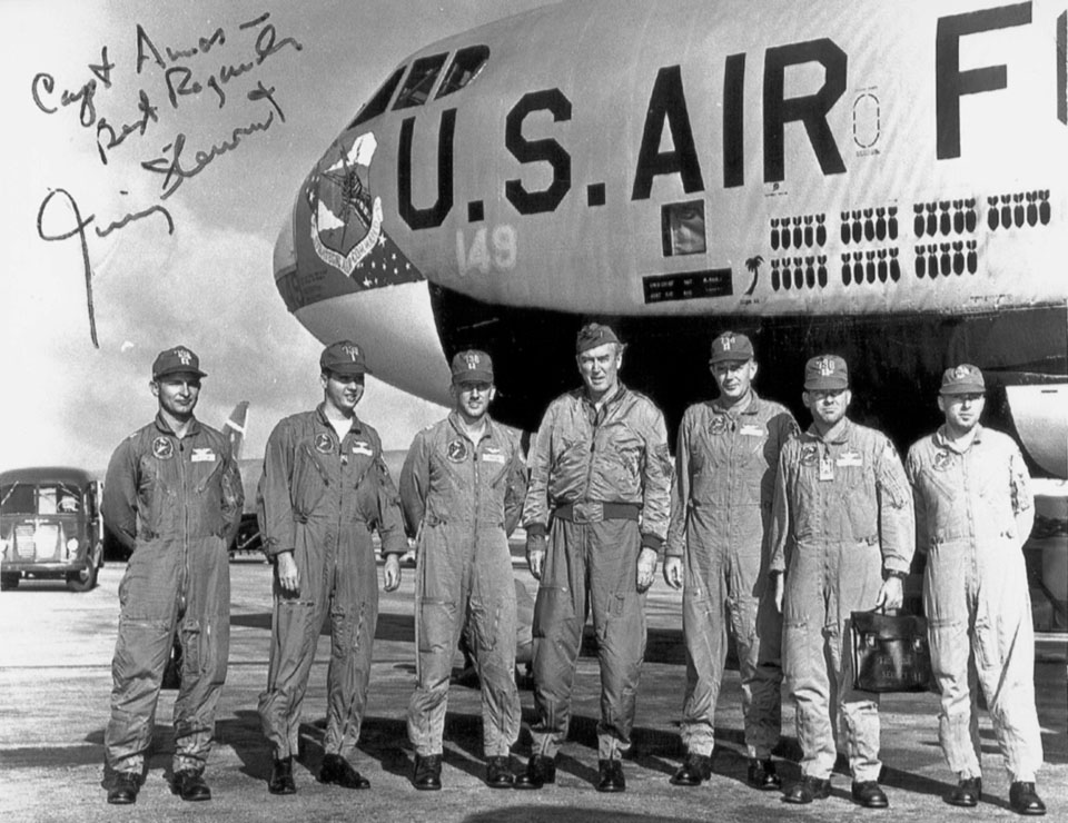Stewart (center), with Amos on his right, and the B-52 crew moments after safely landing at Andersen. Before leaving Guam the next morning, Stewart thanked Amos and presented him with signed prints for each of the crewmen. (Courtesy Bob Amos)
