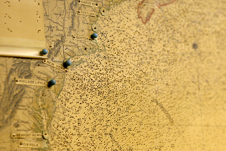 Stretched across a wall in Churchill’s Cabinet War Rooms, thousands of pushpin holes chart the life saving convoys that crossed the Atlantic. 