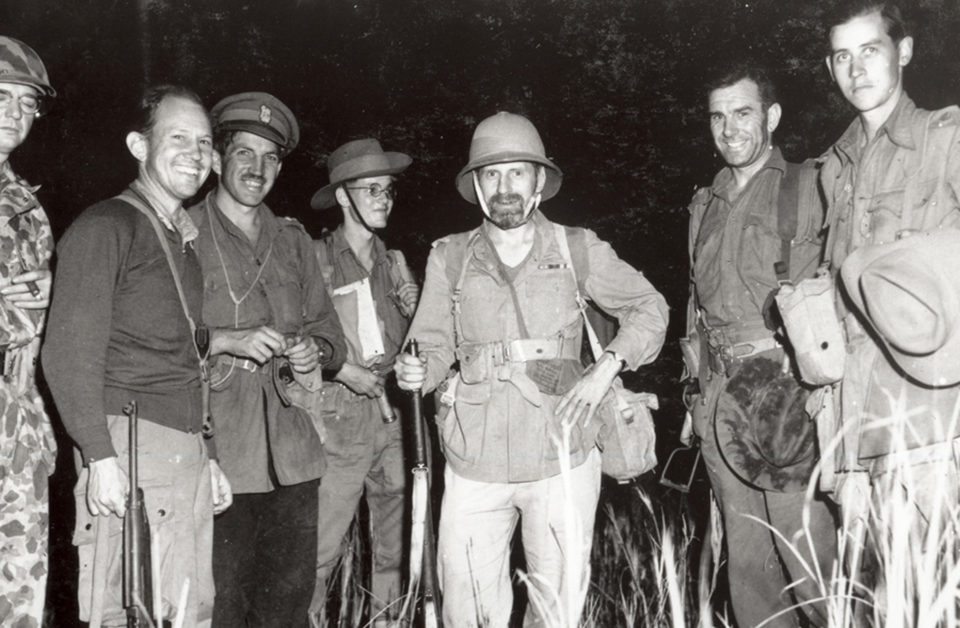 General Orde Wingate (center) along with other officers at the airfield code-named "Broadway" in Burma waiting for a night supply drop. (left to right) Col. Frank Merrill, Col. John R. Alison, Brig. J. M. Calvert, Capt. Borrow (Wingate's aide), Gen. Wingate, Lt. Col. W Scott and Maj. Francis Stewart. (National Archives)