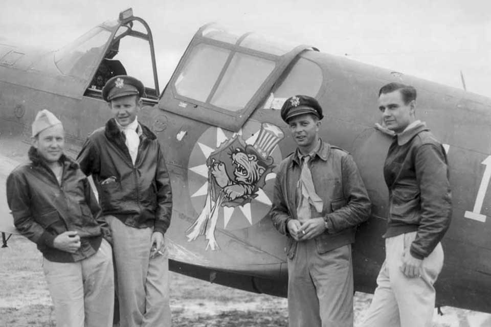 Johnny Alison (far left) stands with members of the American Volunteer Group, now serving with the 23rd Fighter Group in China. Next to Alison is Maj. David Hill, Capt. Albert "Ajax" Baulmer, and Lt. Mack Mitchel. (National Archives)