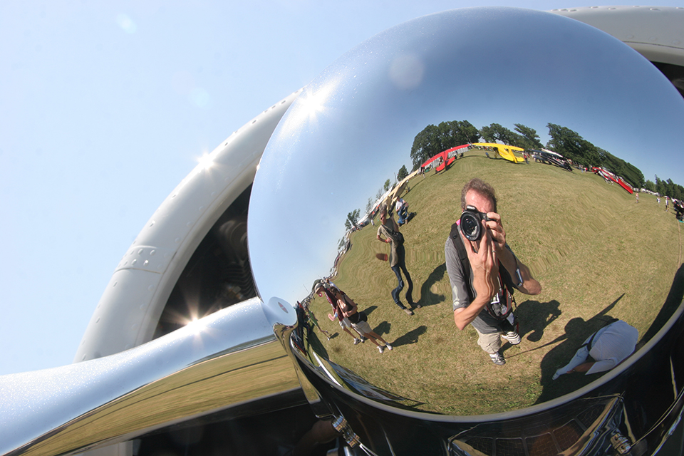 The polished spinner of a Staggerwing makes for an interesting self portrait. 