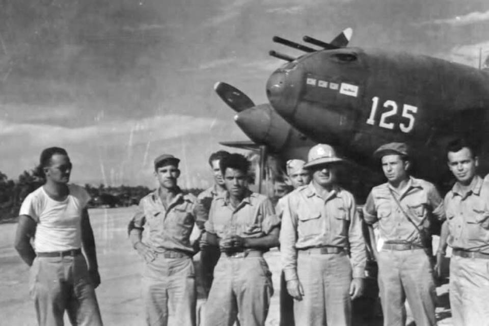 Among those gathered in front of one of the 339th Squadron’s P-38s are (from right) 1st Lt. Rex Barber, Major John Mitchell, Thirteenth Air Force commander Maj. Gen. Nathan Twinning and Captain Thomas Lanphier Jr. (National Archives)