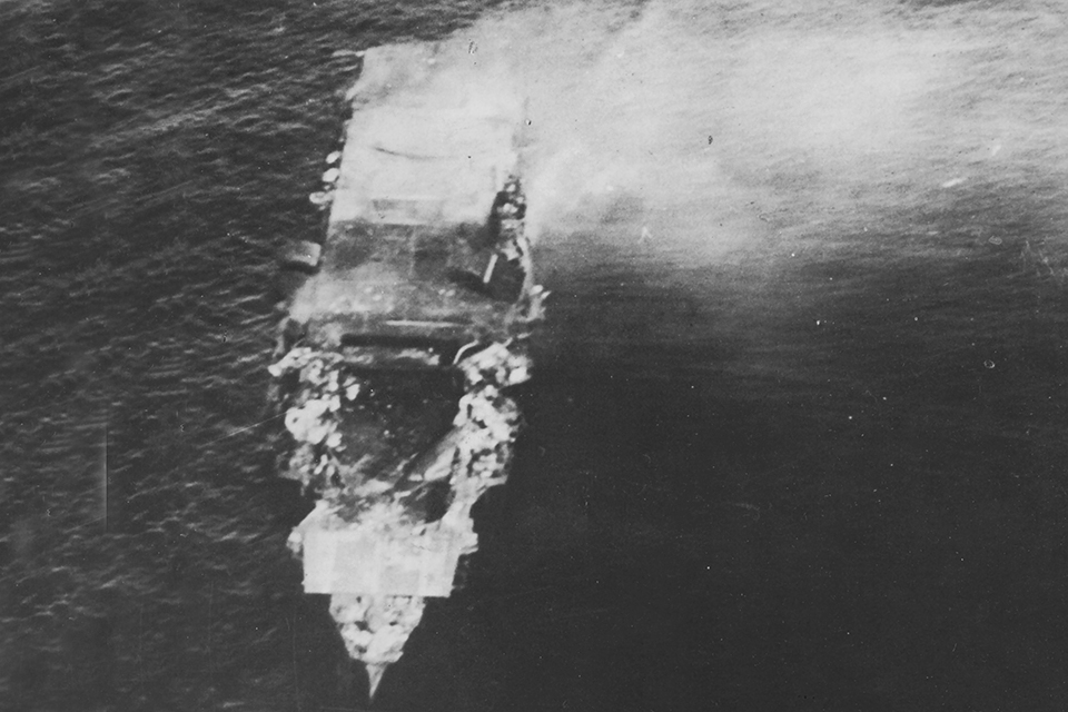 The last of the four Japanese carriers lost, Hiryu, had been hit by four 1,000 pound bombs. Burning and dead in the water, the carrier was scuttled on the morning of June 5th. (National Archives)