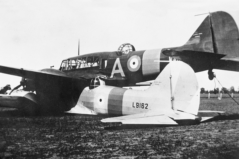 Leonard Fuller's skill and quick thinking saved one of two conjoined Avro Ansons to fly another day. (Australian War Memorial)