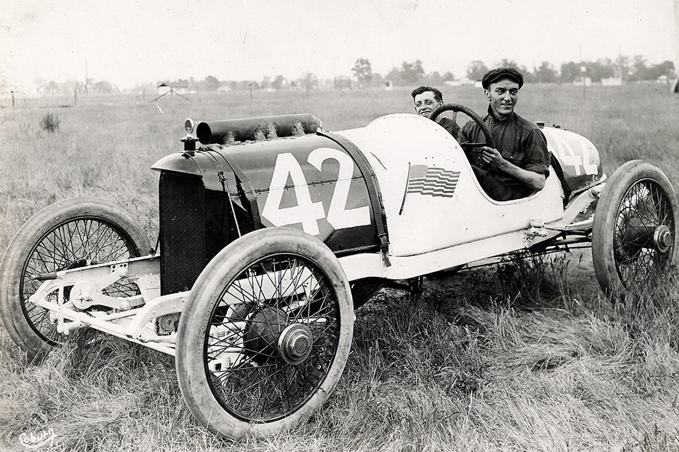 Driving the red, white and blue #42 Duesenberg in the 1914 Indy 500 Race, Eddie finished a strong 10th of the 42 entrants, averaging 70.8 mph and winning $1,400. (Library of Congress)