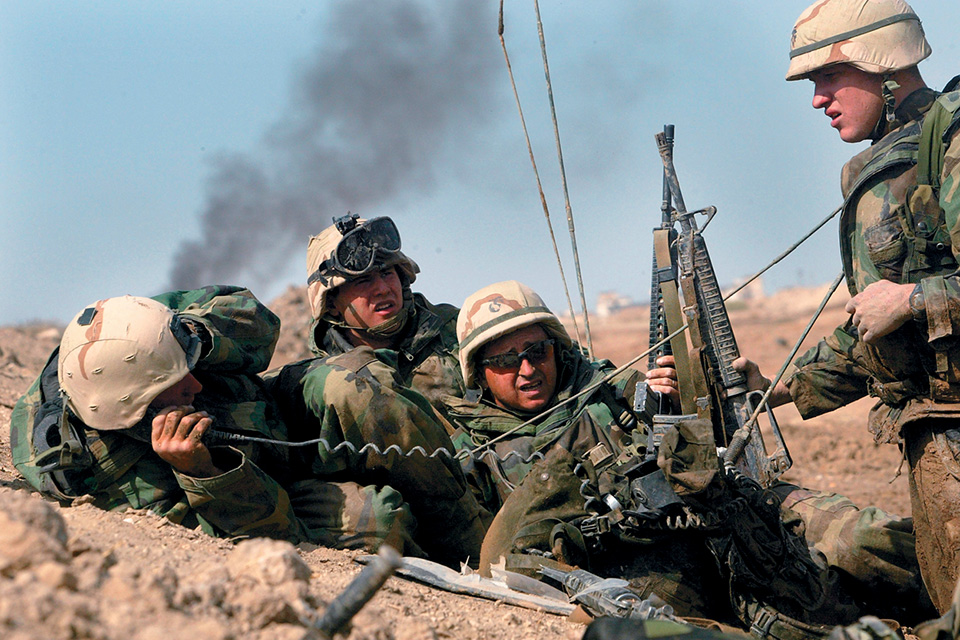 A group of Marines under fire at Nasiriyah calls for air support. (Joe Raedle/Getty Images)