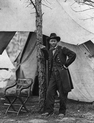 This photograph shows Ulysses S. Grant at his Cold Harbor headquarters on June 11 or 12, 1864.