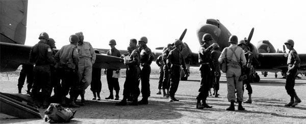 American paratroopers assemble on a Sicilian airfield near the time of the 1943 Giant II mission to seize Rome. (National Archives)