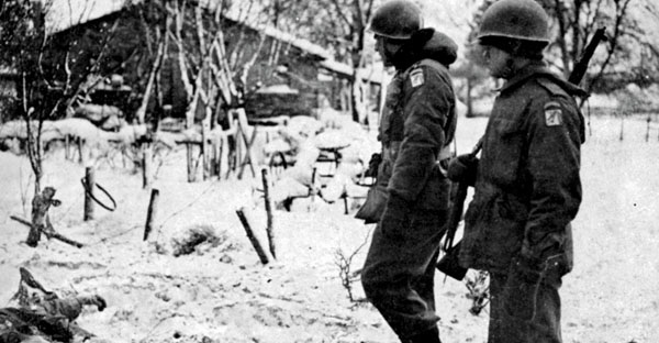 Ridgway (left) surveys a Nazi strongpoint in Belgium after it was overrun by infantrymen from the XVIII Airborne Corps. (National Archives)
