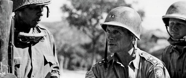 Ridgway confers with an infantry officer in October 1943, shortly after the Allies had claimed southern Italy. (National Archives)