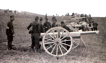 A French battery preps a 75mm canon.