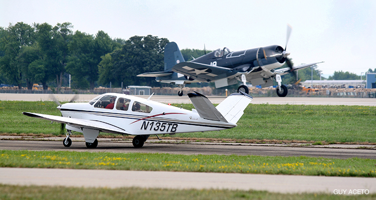 History comes in many forms, like this Beachcraft V35A Bonanza built in 1969 taxiing past the Cavanaugh Flight Museum's FG-1D Corsair.