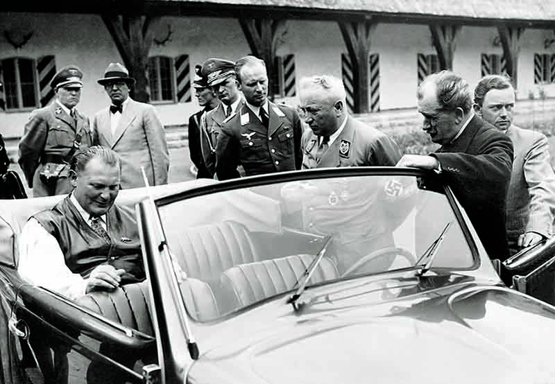 Nazi big shots Hermann Göring (above) and Robert Ley (at right, below) admire early VWs. ©Sueddeutsche Zeitung Photo/Alamy