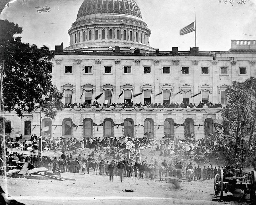 Many of the troops had camped in Arlington and crossed the Long Bridge into the city. They walked by the crowds and the Capitol, still displaying black mourning crepe before proceeding down Pennsylvania Ave. (Library of Congress)