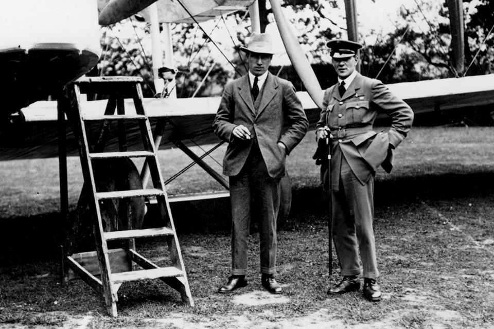 Alcock (right) and Brown pose with their Vickers Vimy. (Hulton Archive/Getty Images)