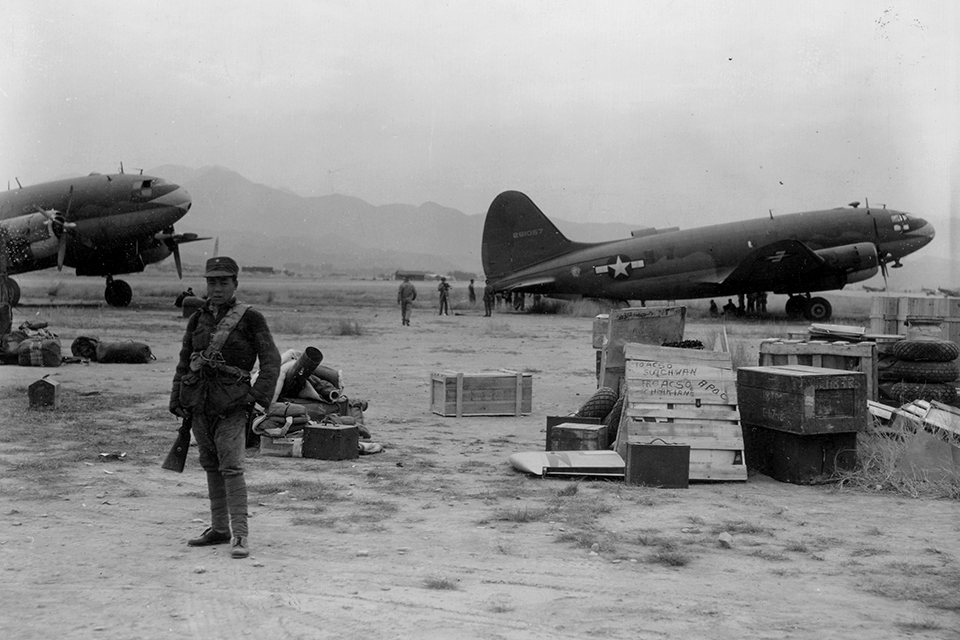 The Commandos' stock in trade was the ability to transport large quantities of supplies to remote unprepared airfields like this one, "somewhere in China." (National Archives)