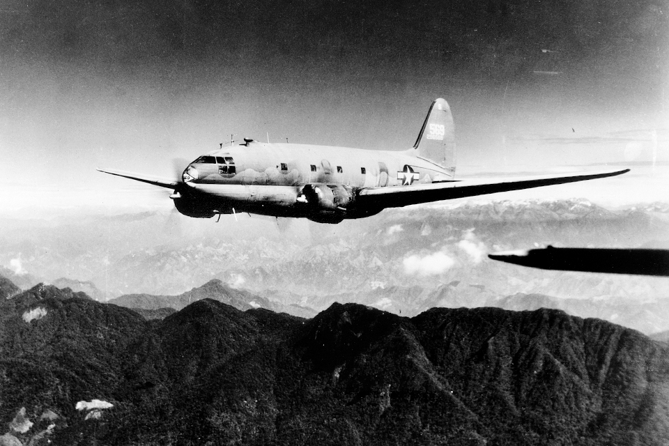 A C-46 tackles its most famous challenge, the "Hump" route through the Himalayan between India and China. (National Archives)