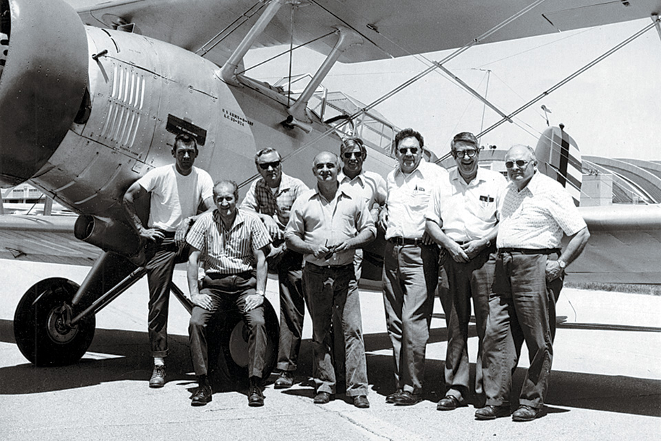 Standing proudly with the refurbished aircraft in 1974 is the Air Force Museum's restoration crew: (Left to Right) Ed MacFarland, Ron Petry, Harold Longberry, Walter Olson, Nelson Hall, Charlie Gebhardt (Chief of Restoration), Joe Mantz, John Gassert. (National Museum of the U.S. Air Force)