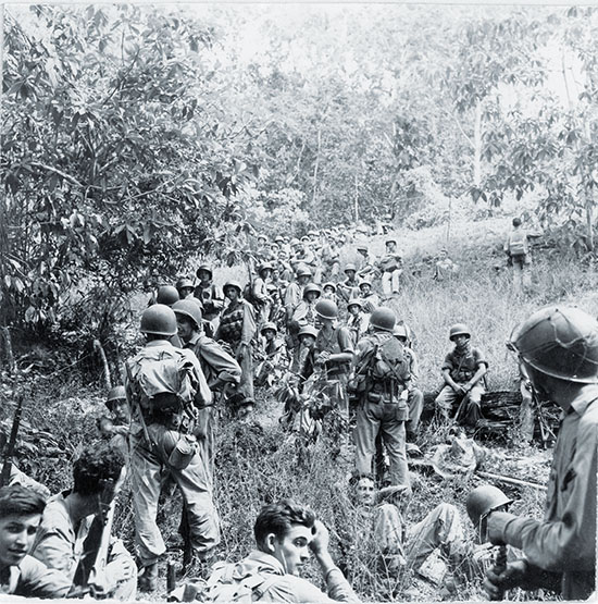 Marines take a breather in Guadalcanal’s extreme heat. Climate and illness claimed more Raiders than did the Japanese, with 225 falling sick during their long patrol.