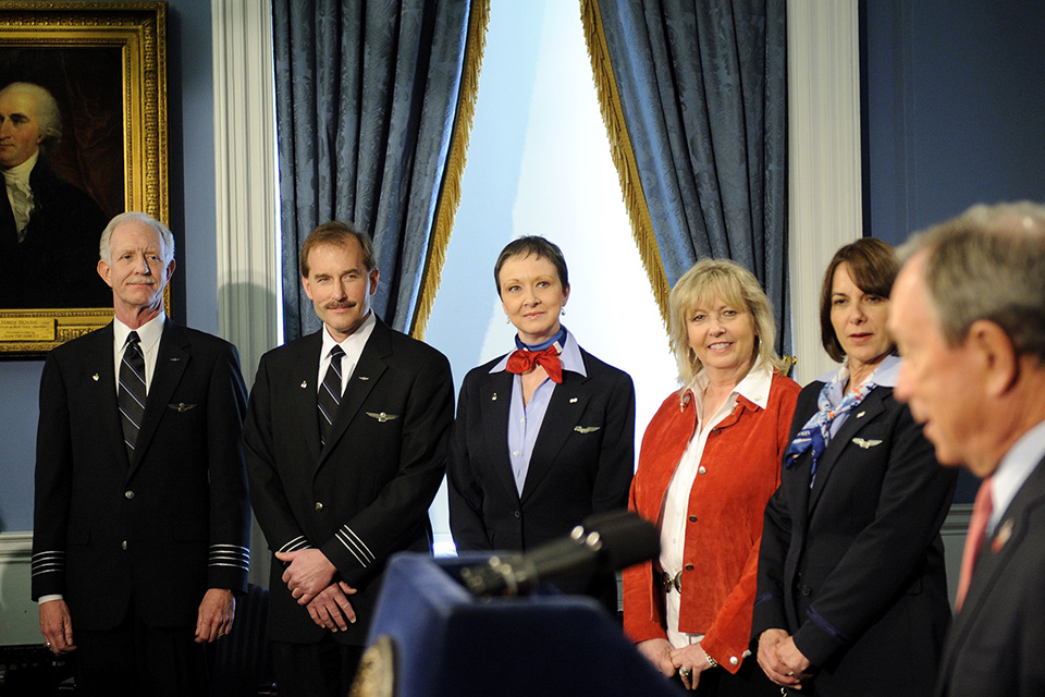 From left: Sully, First Officer Jeffrey Skiles and Flight Attendants Donna Dent, Doreen Welsh and Sheila Dail meet with New York City Mayor Michael Bloomberg on February 9, 2009, to receive the keys to the city. (AP Photo/Stephen Chernin)